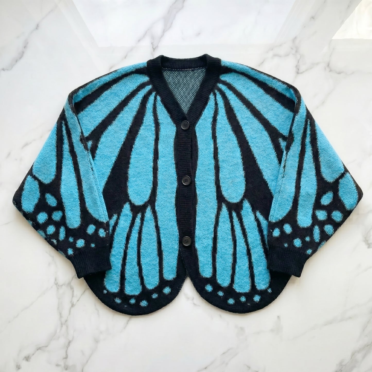 Cárdigan Alas de mariposa
